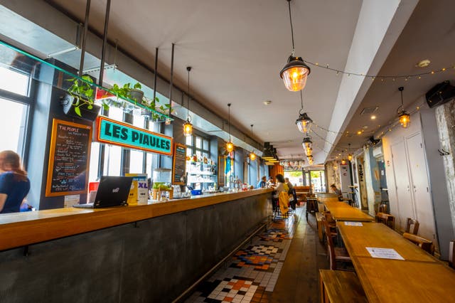 <p>A complimentary drink token helps keep the hostel’s bar sociable </p>